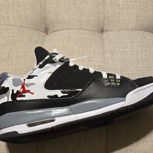 Black and White Camouflage Sneakers with Red Accent